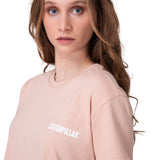 Polera Manga Corta Mujer Boxy Thrive Graphic Rosado
