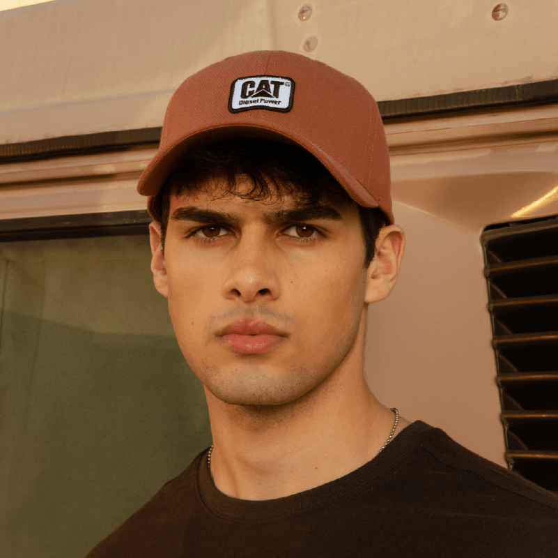 CAT jockeys y gorros